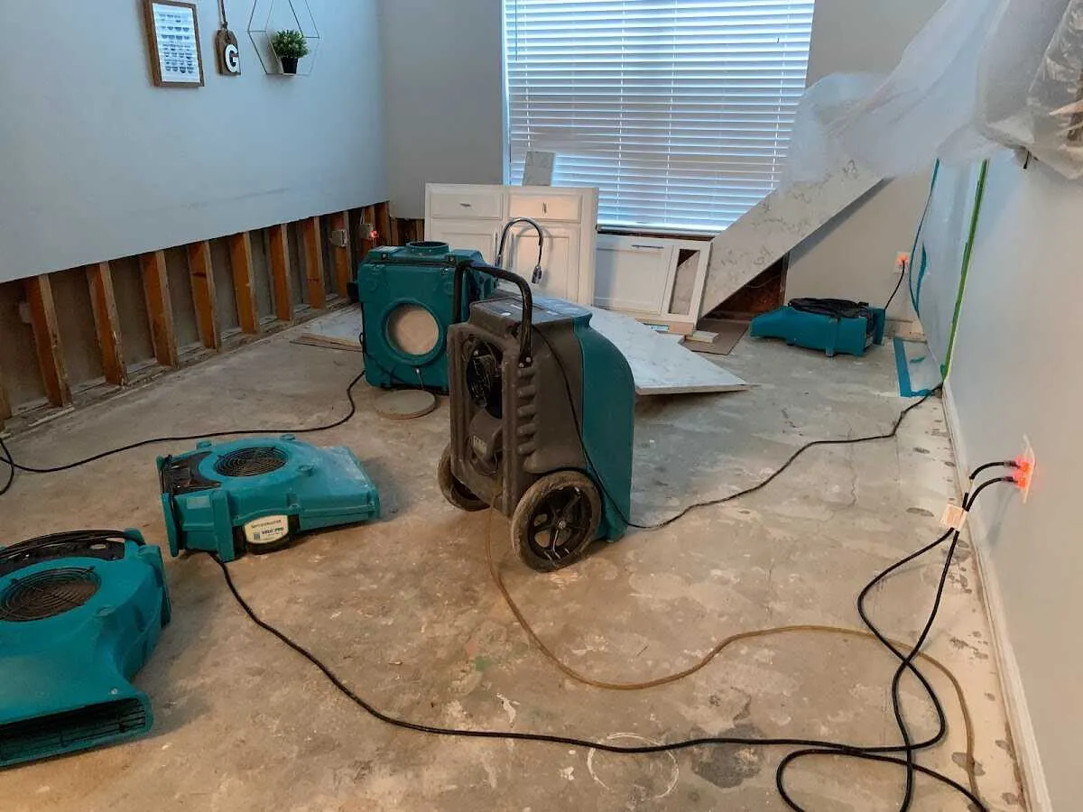 Dehumidifier in flood-cut room for Water Damage Restoration in Peachtree City